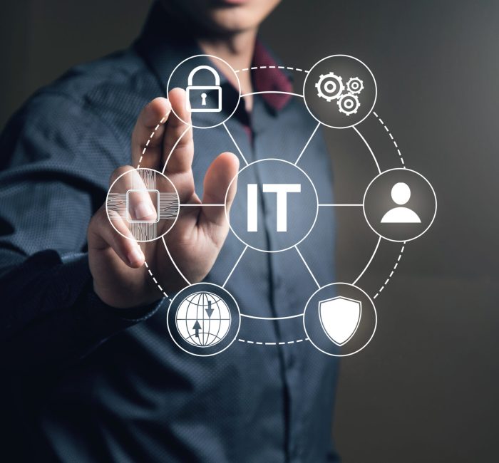 IT technology icons in a circle. Man tapping on the screen